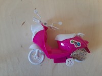 Мотоцикл для кукол розовый, 13*11 см.